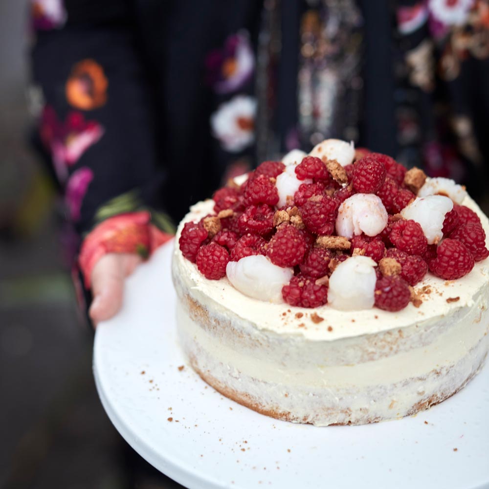 Pistachio cake with raspberries and lychee mousse recipe | DELICIOUS